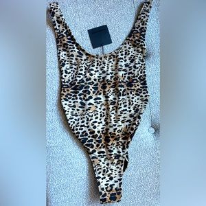 One piece, swimsuit, size small, leopard print, new with tags, brand Dixperfect